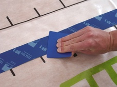 6. Rubbing the adhesive joint firmly