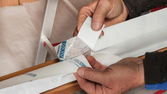 4. Stick the tape all around the window frame