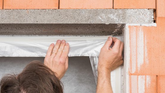 4. Apply masking tape to the window frame